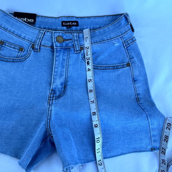 New Women’s Bebe Denim Shorts Stone Embroidered Sz 2 (26) NWT Light Wash Raw Hem - Picture 9 of 9